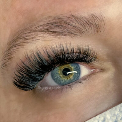 Project Ink Client Photo with eyelash extensions blue green eyes